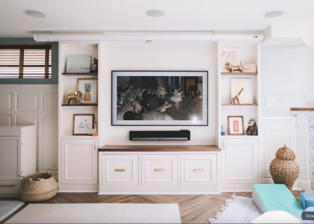 living room media center with in-ceiling multi-room audio and custom TV mounting in Austin TX